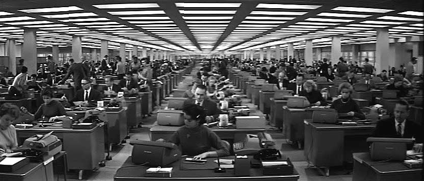 Desks and typewriters, as far as the eye can see